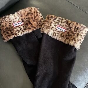 NWOT $50 Hunter boot liners. Black fleece w/ leopard cuff. Fits tall boot. Large